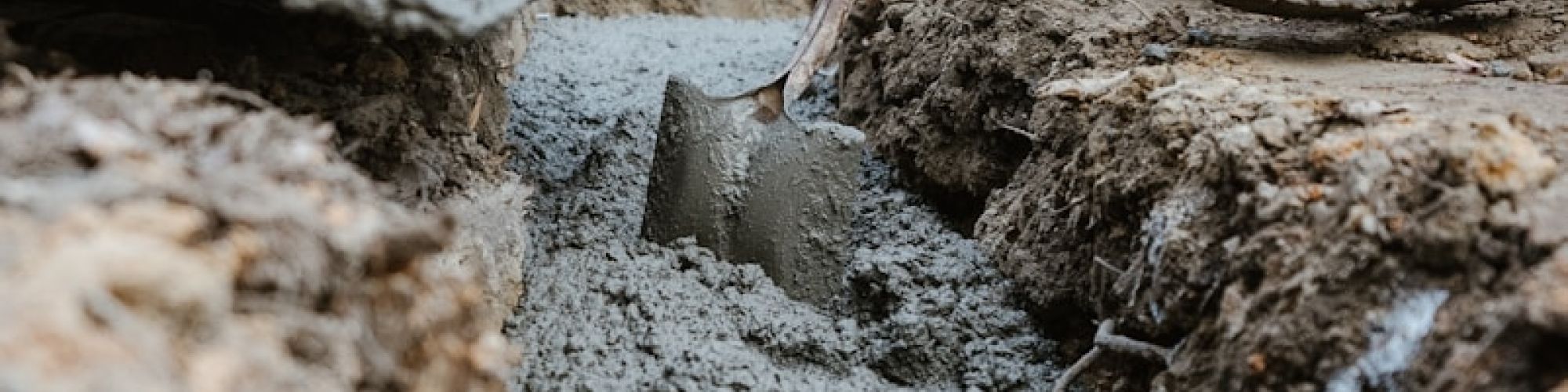 a person digging in the dirt